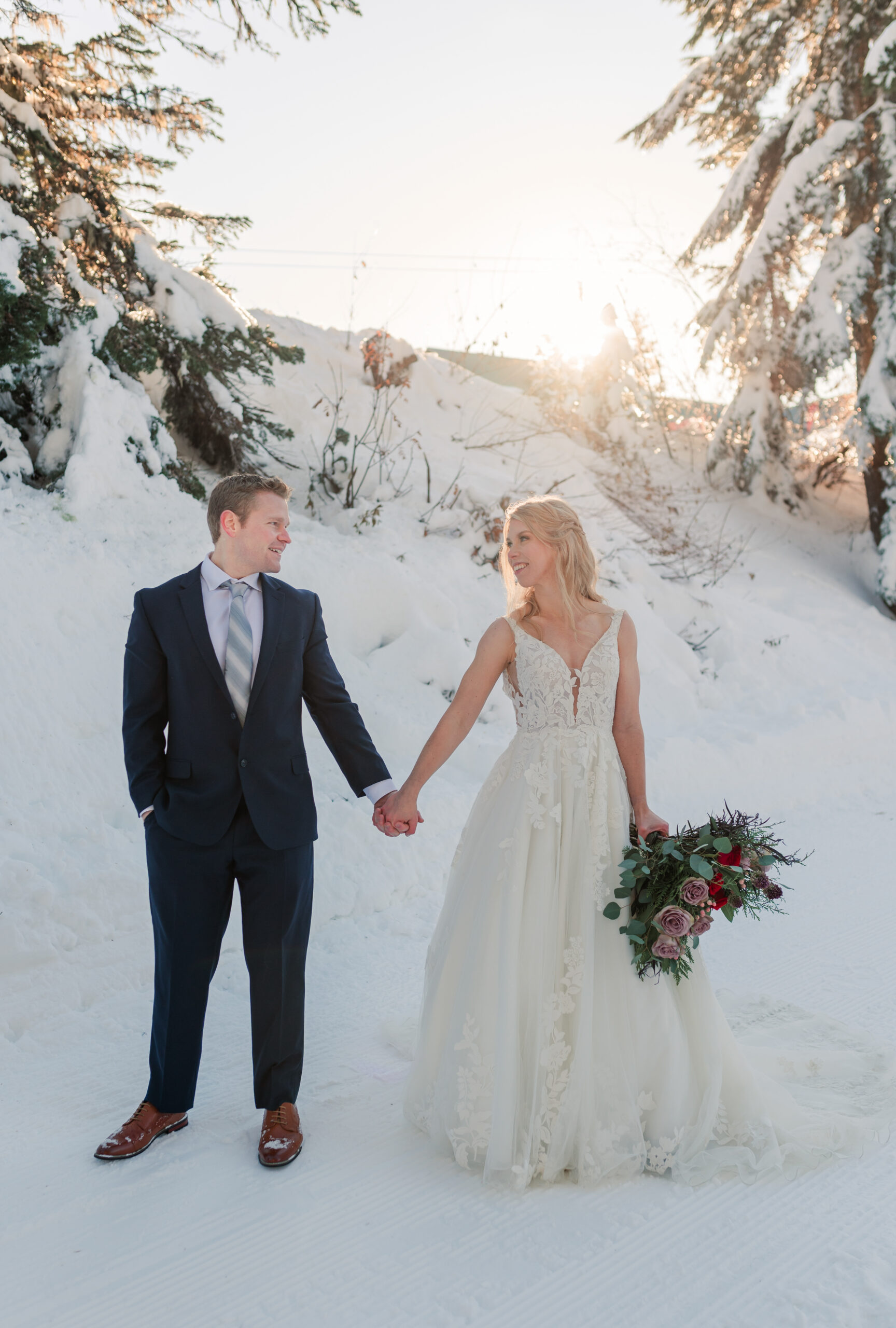 Bride-and-groom-looking-at-each-other-at-grouse-mountain