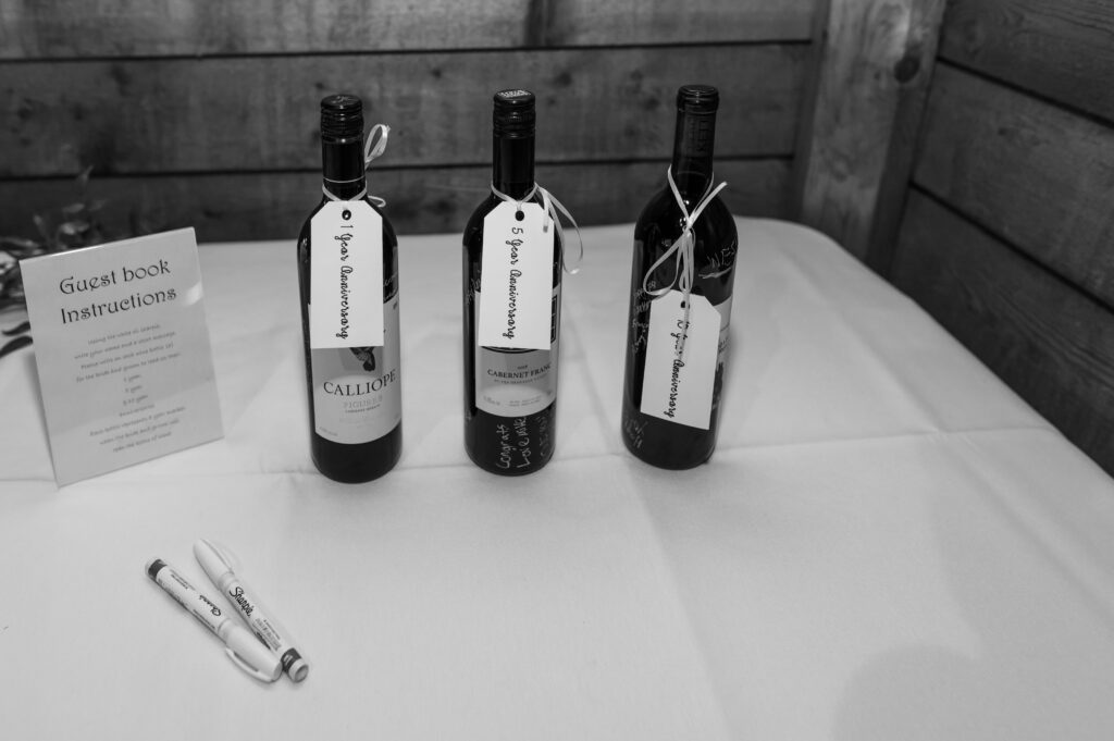 Wedding wine at Fraser River Lodge one says 1 year anniversary, 5 year anniversary and 10 year anniversary.