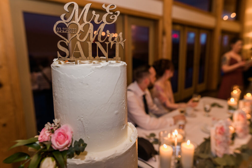 Wedding cake and Fraser River Lodge Hall.