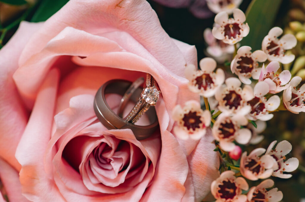 Bouquet flowers and rings for detail shoots on a wedding day.