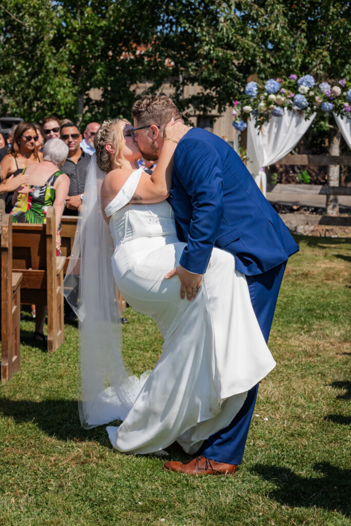 Wedding ceremony first romantic kiss at Loft Country.